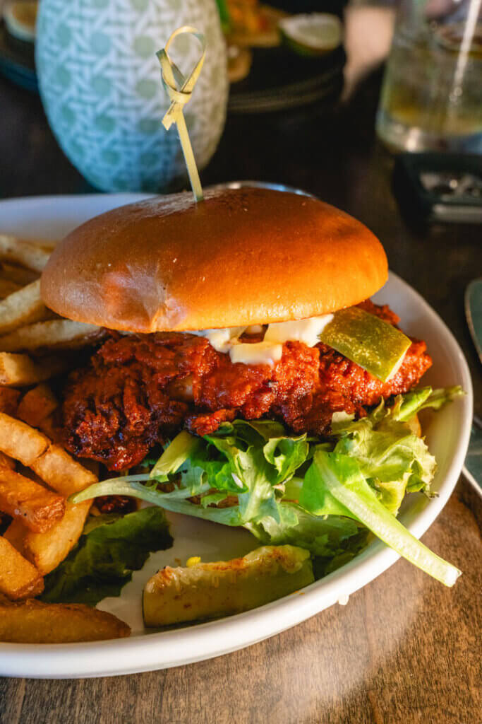 nashville hot chicken sandwich from The Barn at Hope Farm in Fairhope Alabama