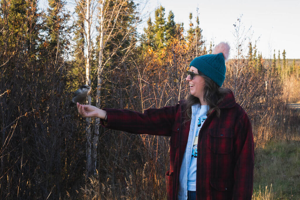 Megan making a bird friend at the Arctic Circle in Alaska