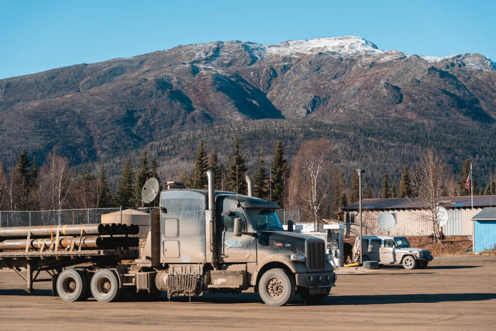 alaska pipeline semi truck on the dalton highway stopped at Coldfoot Camp truckstop in Alaska