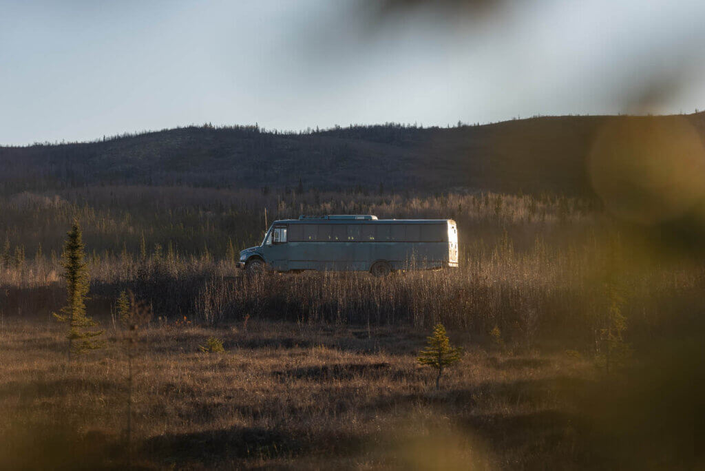 our Arctic Circle and Dalton Highway tour bus stopped while we check out an alpine tundra in Alaska