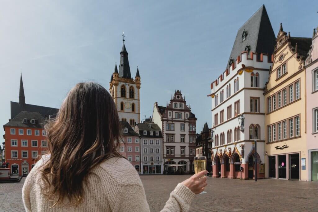 Megan enjoying a glass of Moselle wine from Wine Stand Trier (Hauptmarkt) in Germany