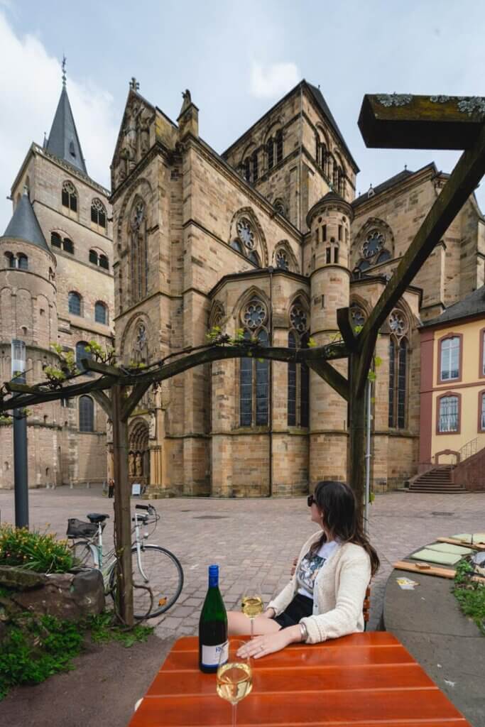enjoying wine from Kesselstatt with views of the Trier cathedral