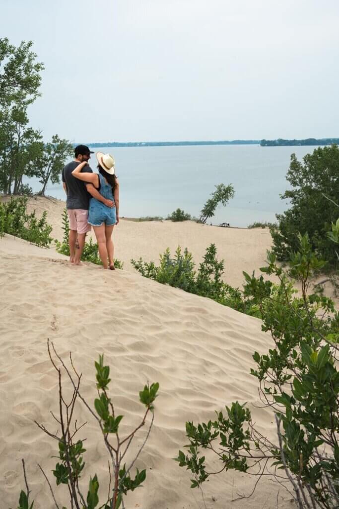 Megan and Scott on the sand dunes at Sanbanks Provincial Park in Ontario Canada
