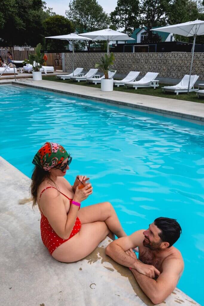 Megan and Scott poolside at Lakeside Motel in Wellington Ontario in Prince Edward County
