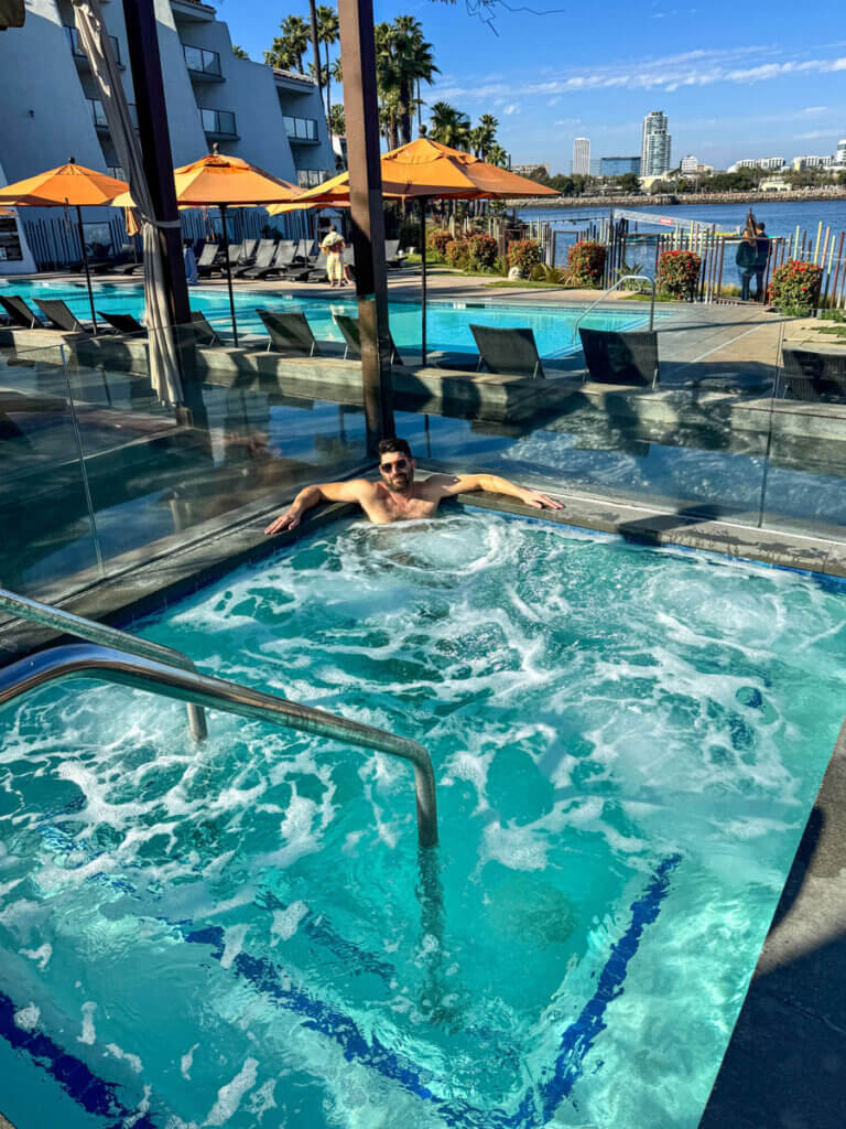 Scott-in-the-jacuzzi-at-Hotel-Maya-in-Long-Beach-California