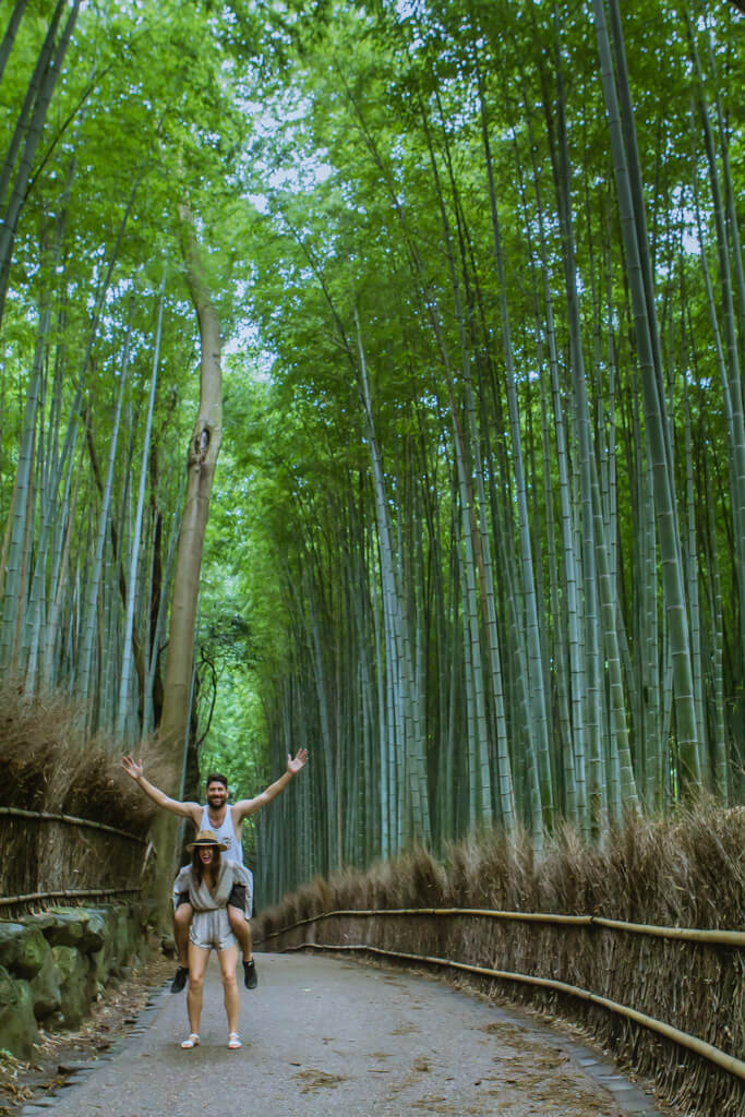 Boy rides girls back at Arashiyama Bamboo Forest