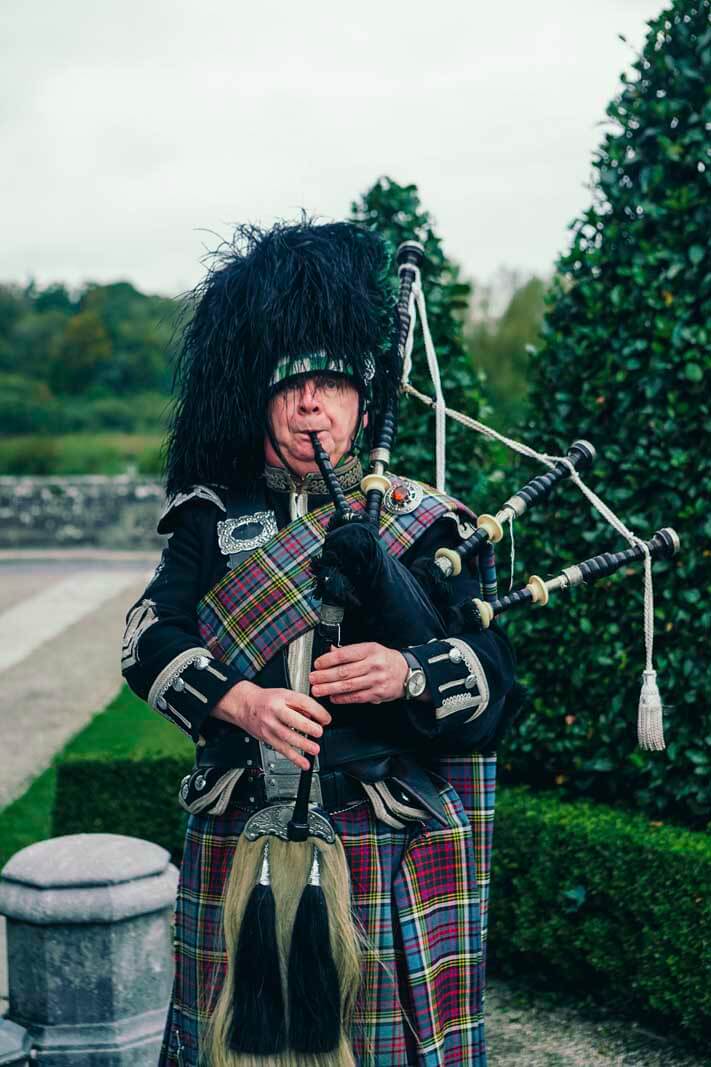 Bag pipe player at Dromoland Castle Hotel in Ireland