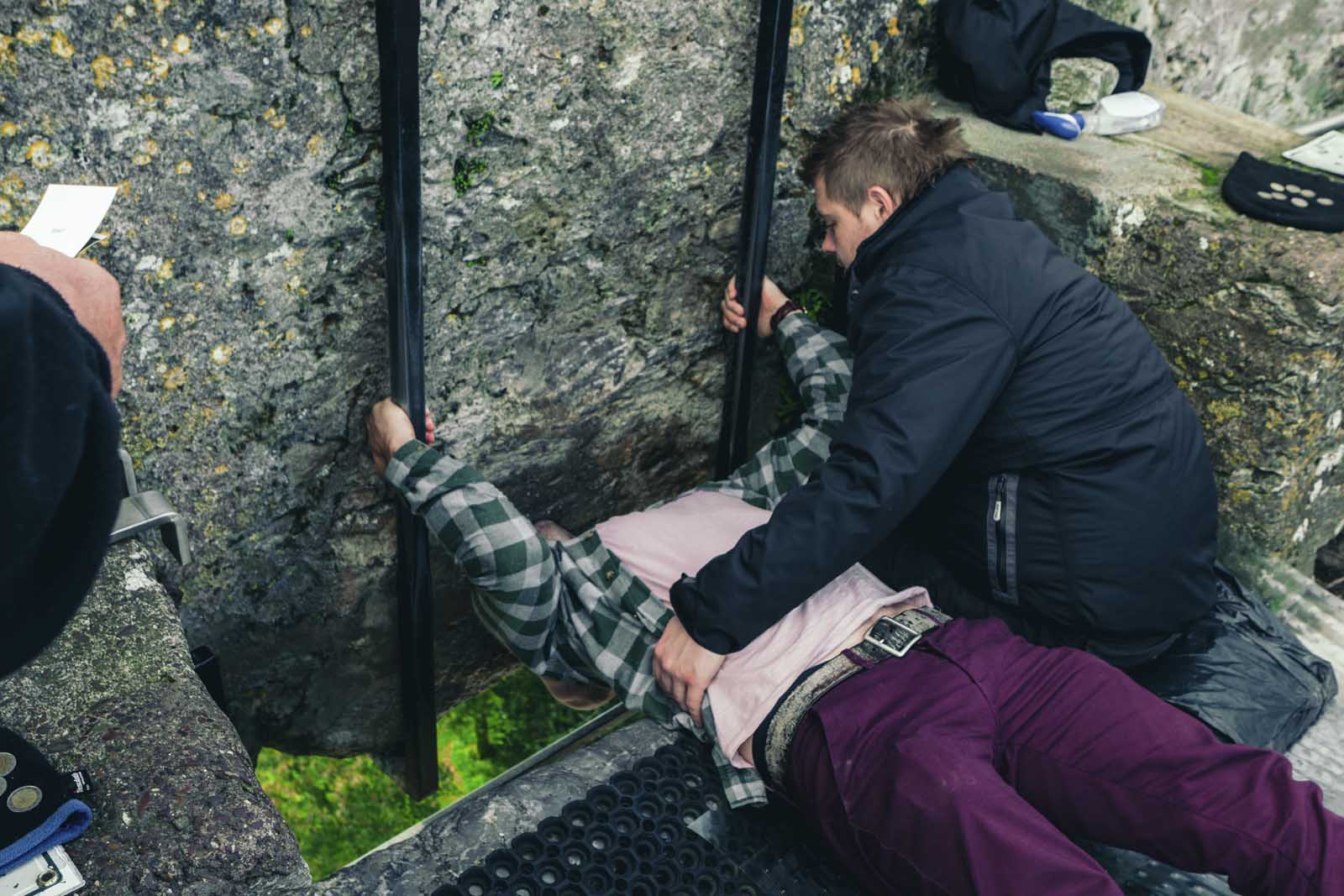 Scott kissing the Blarney Stone near Cork Ireland