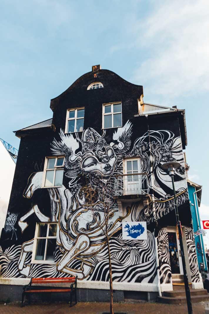 beautiful building covered in a mural in Reykjavik