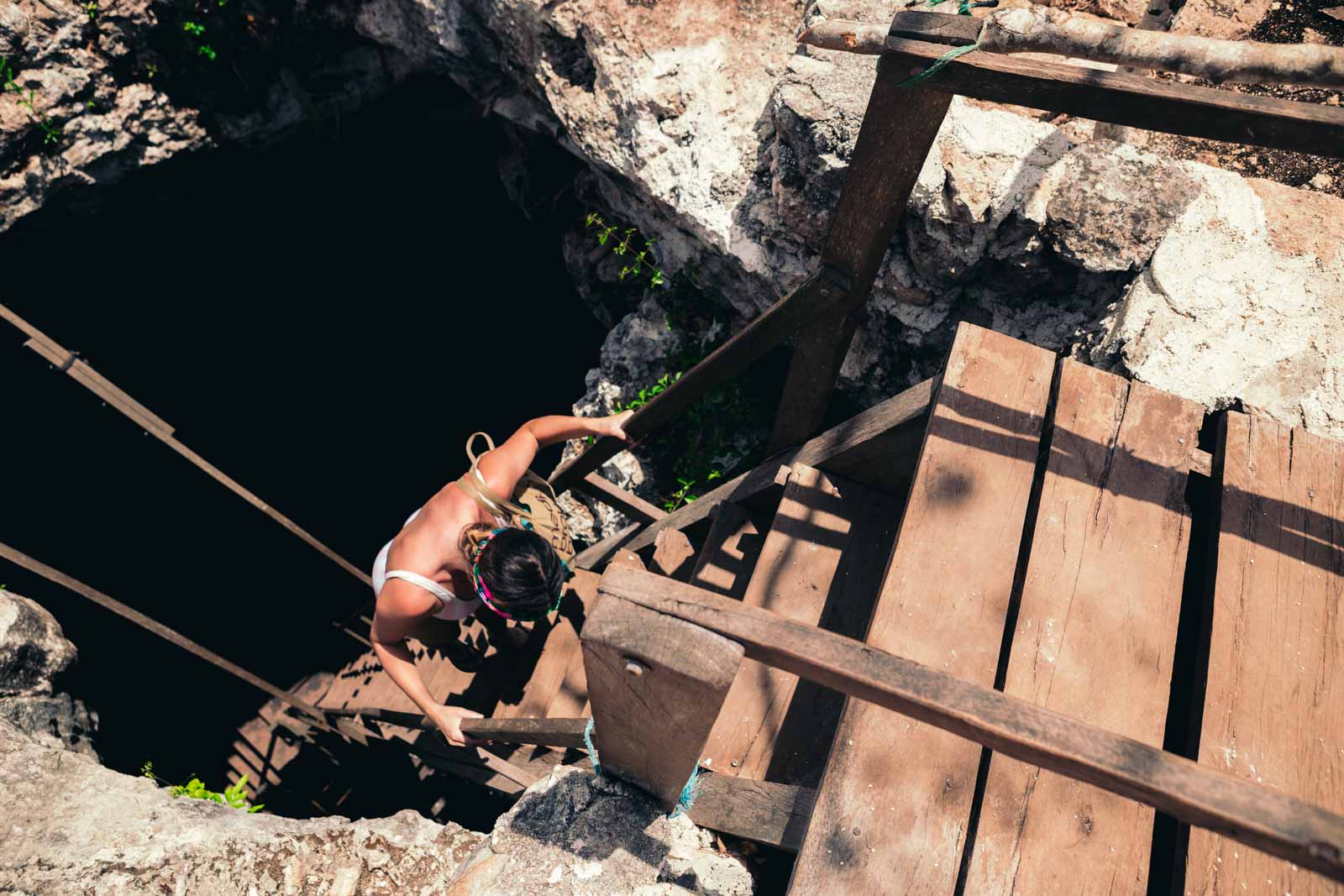 Climbing down to the Xtojil Cenotes in Cuzama