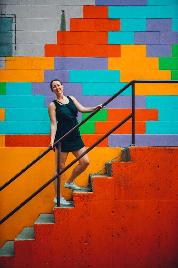 Megan in front of the tetris mural in minot north dakota