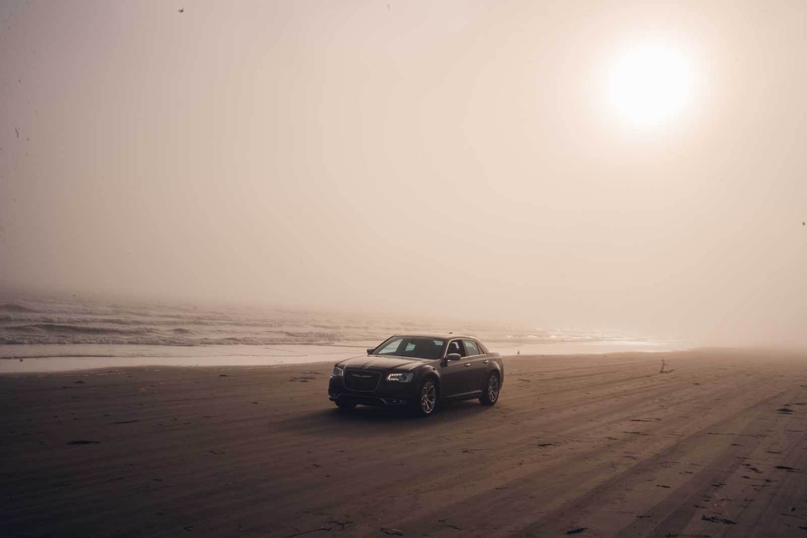 driving the car on a foggy Crescent Beach near LaHave in Nova Scotia