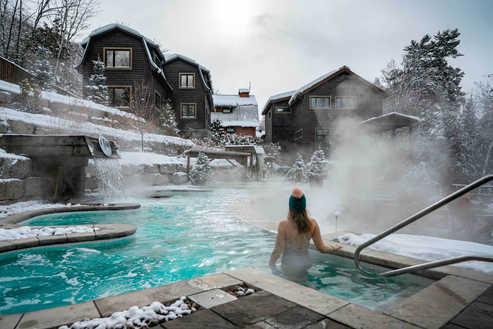 Enjoying the hot pool at Scandinave Spa Mont Tremblant in winter