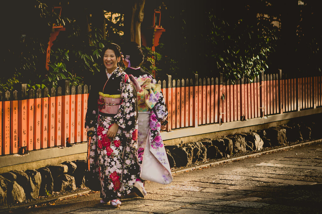 Geisha posing with sword in Gion