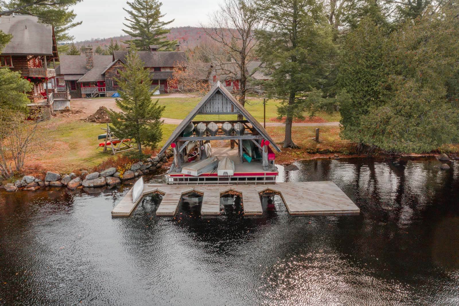 Great Camp Sagamore view from the lake in the fall in the Adirondacks New York