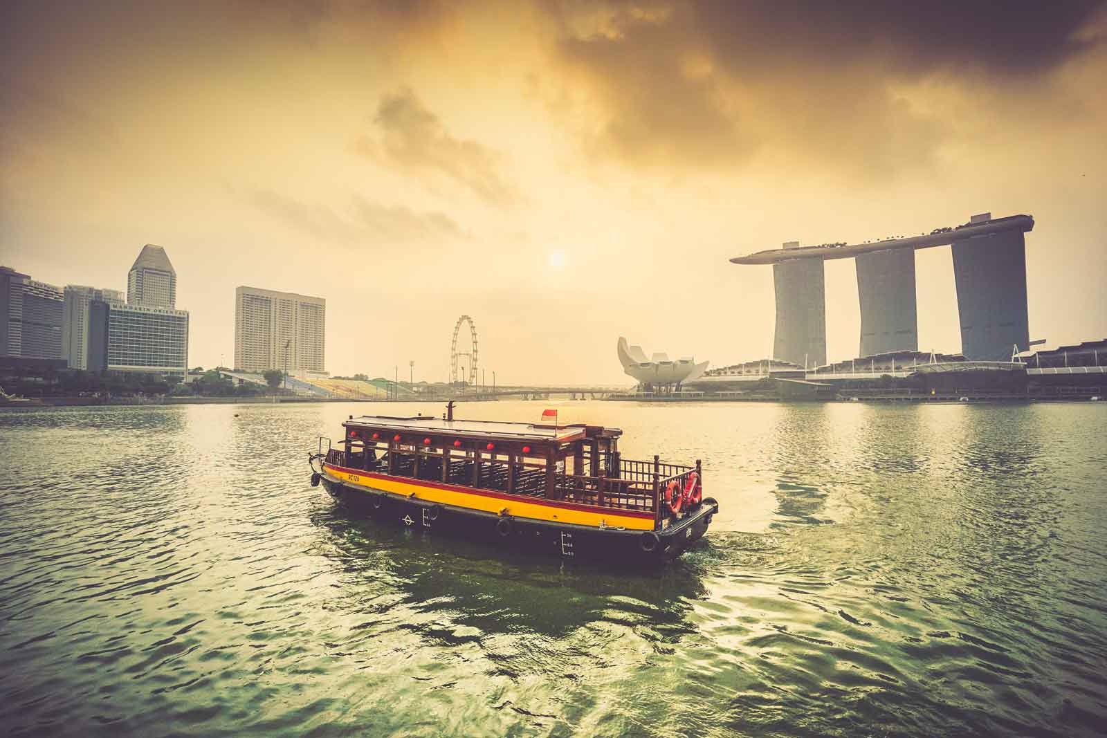 Junk boat in the harbor in front of Marina Bay Sands