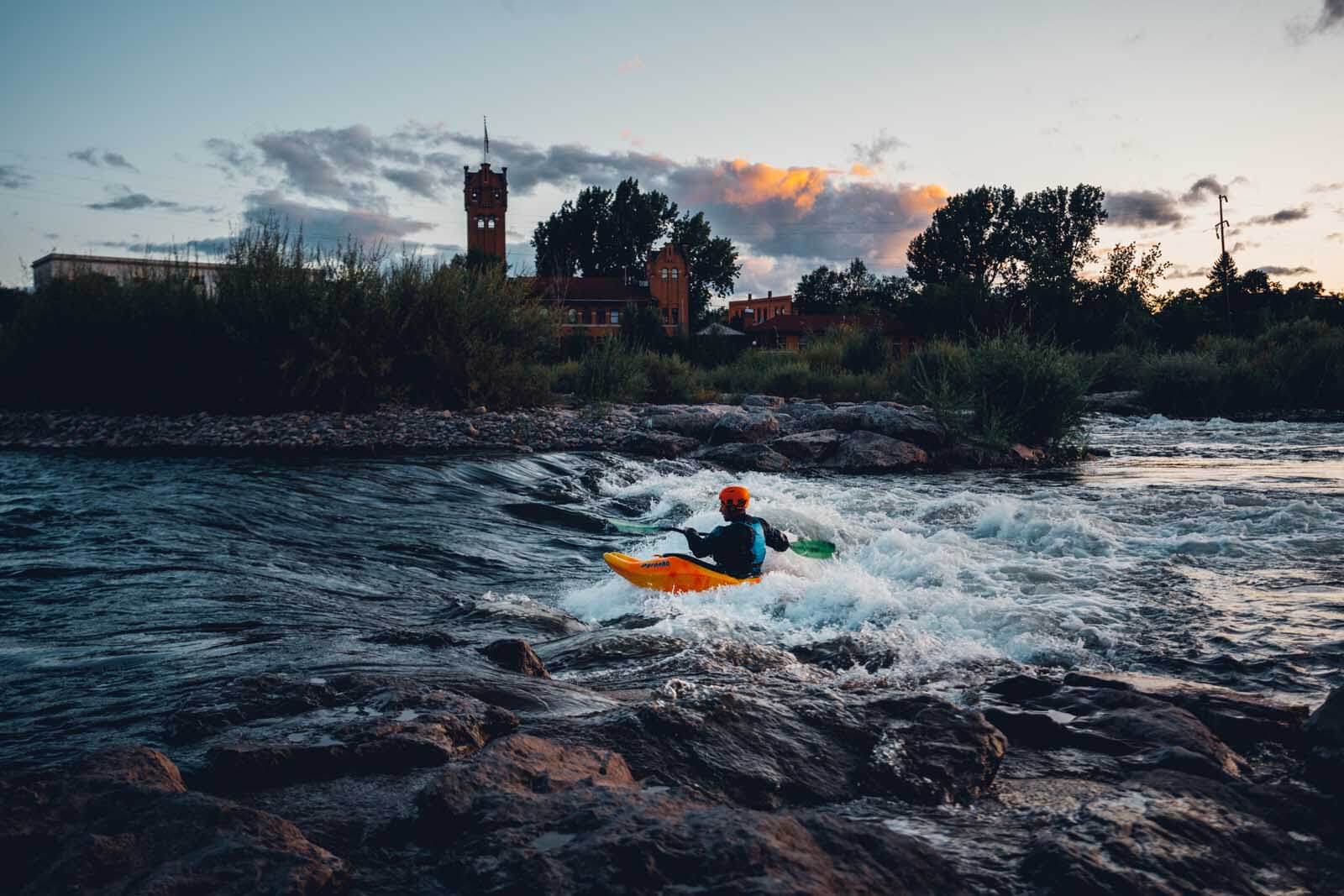 Kayaker practicing at Brennans Wave in Missoula Montana