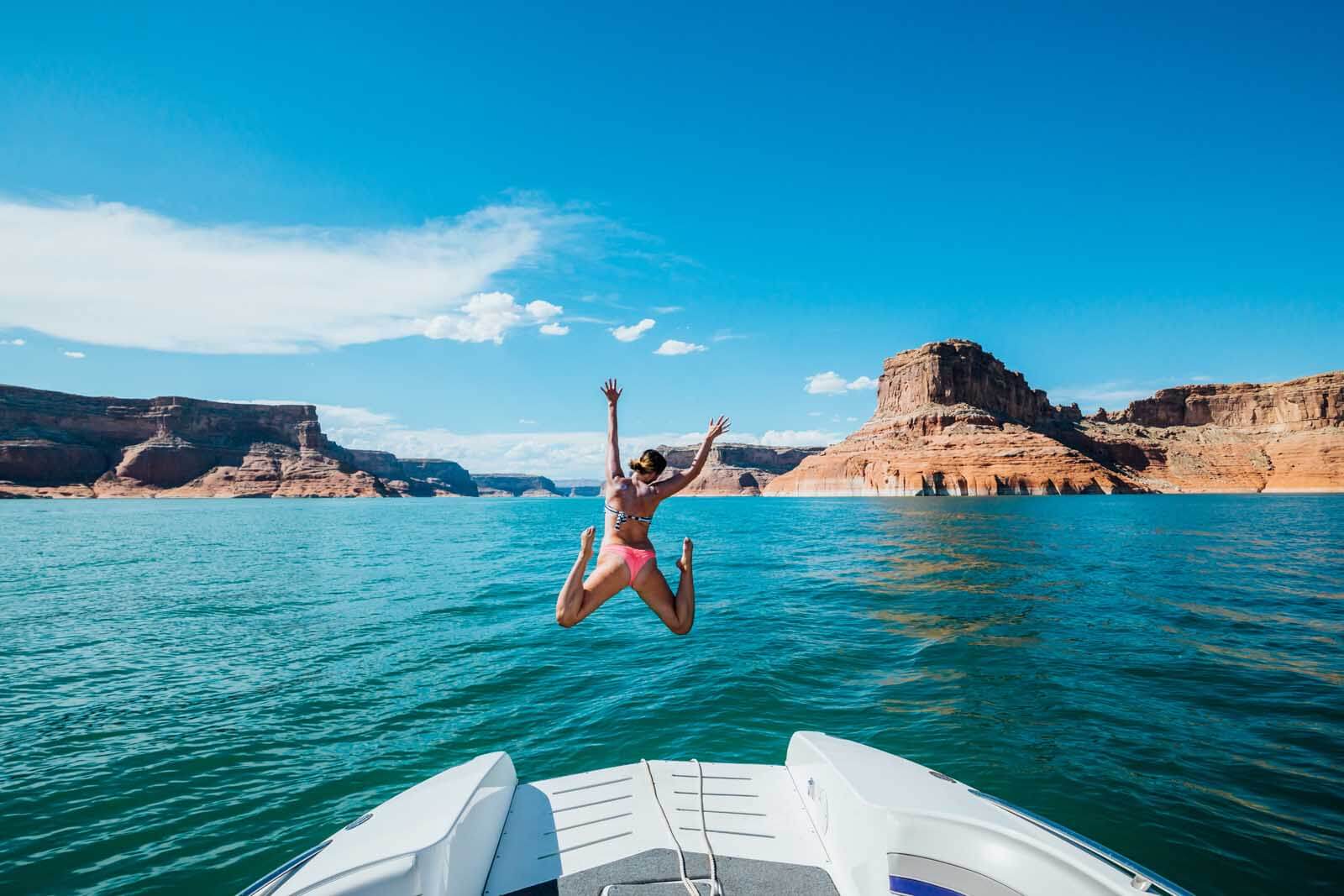 Megan taking the plunge into Lake Powell for a refreshing swim