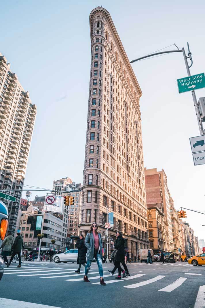 Megan Crossing the Street in front of the Flat Iron Building