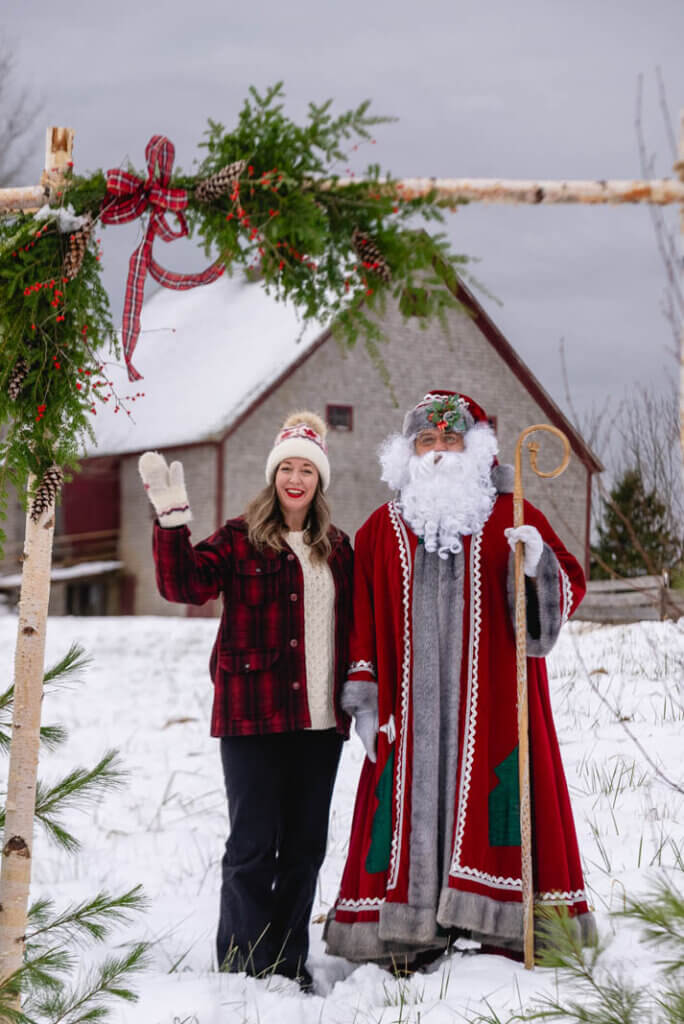 Megan and Father Christmas at the Ross Farm Museum in New Ross Nova Scotia at Christmas