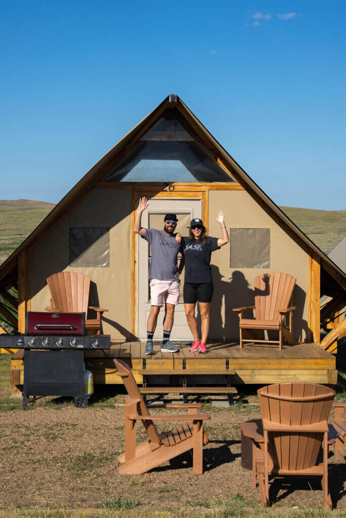 Megan and Scott enjoying camping at an oTENTik campsite in Grasslands National Park in Saskatchewan Canada