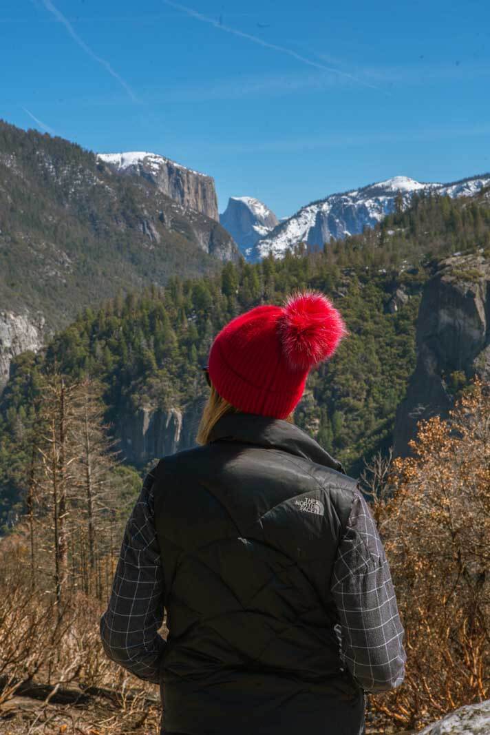 Megan looking at Yosemite viewpoint near the Big Flat Oak Entrance