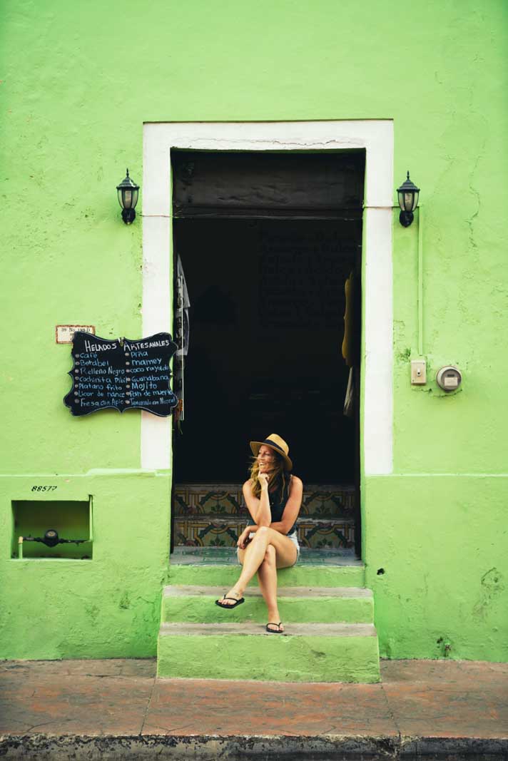 Megan at a fun green building in Valladolid