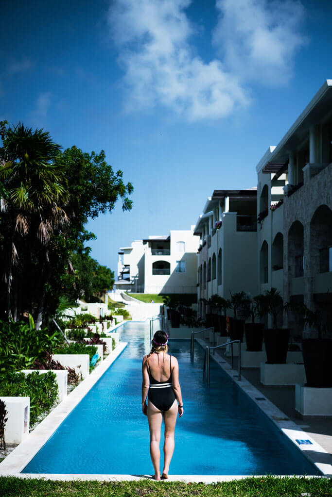 Megan-at-gorgeous-pool-at-Grand-Moon-Palace-Cancun-Solid-and-Striped