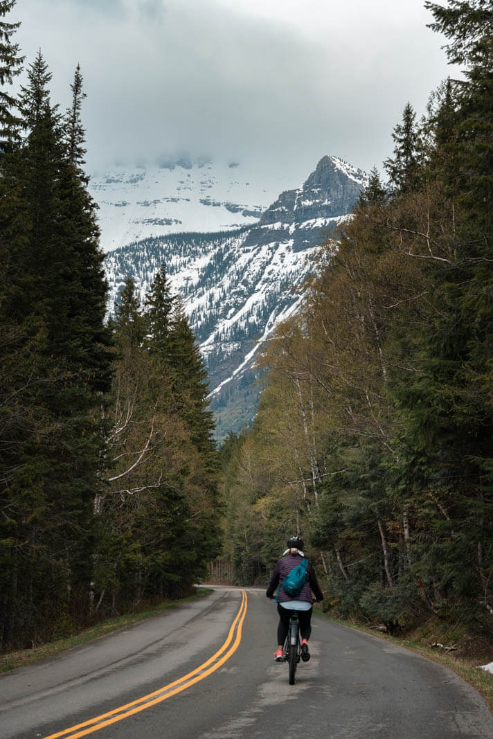 Megan biking on the Going-to-the-Sun-Road in Glacier National Park in Montana