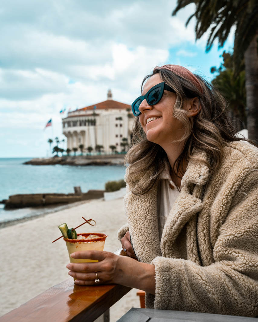 Megan enjoying a drink at Descanso Beach in Catalina Island California
