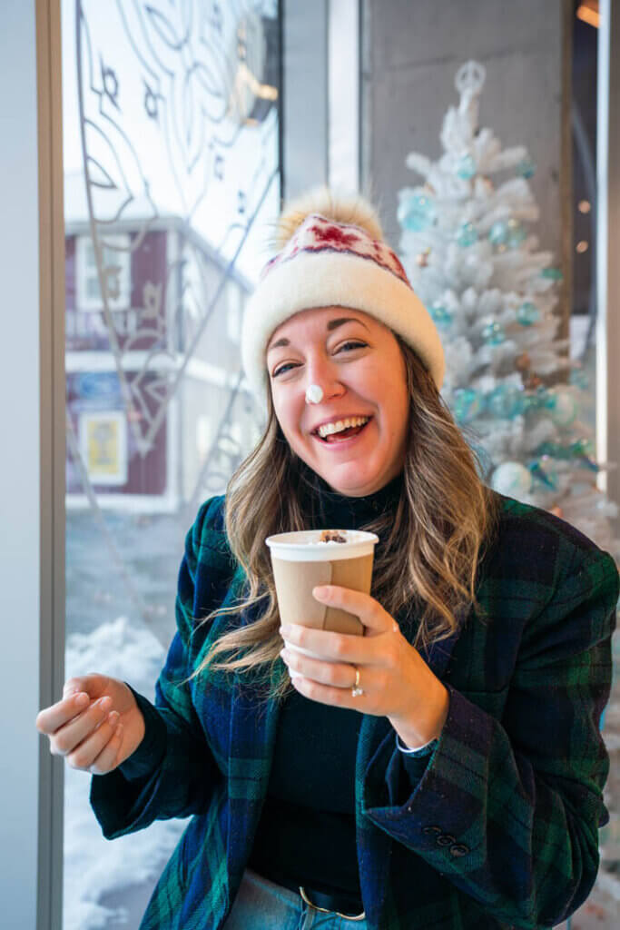 Megan enjoying hot chocolate from Peace By Chocolate in Halifax Nova Scotia