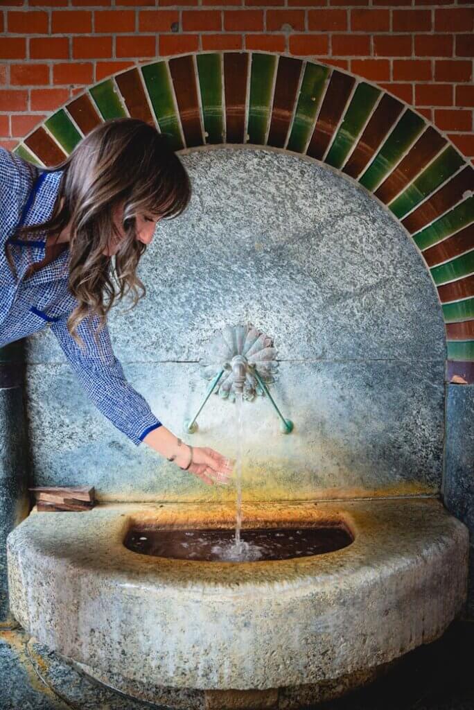 Megan-filling-up-from-the-hot-spring-at-Backerbrunnen-in-Wiesbaden-Germany