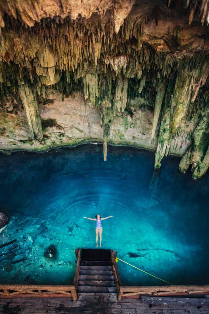 Megan Floating in Santa Barbara Cenote in Homun Mexico not far from Merida