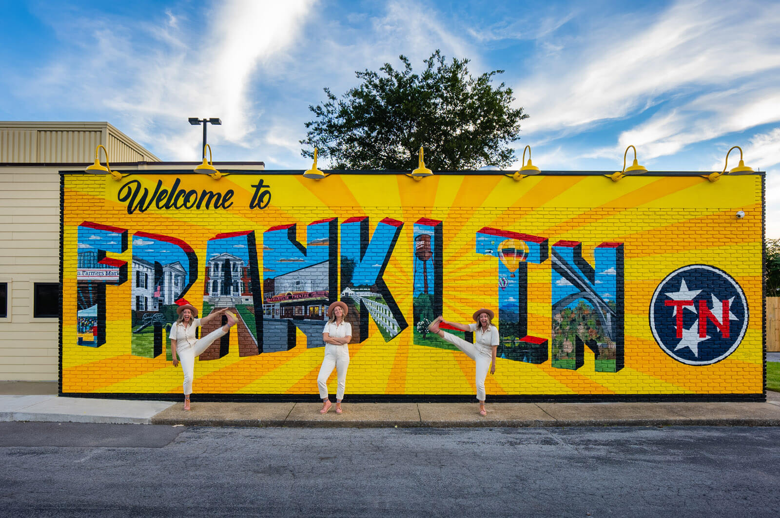 Megan kicking at the Welcome to Franklin Mural