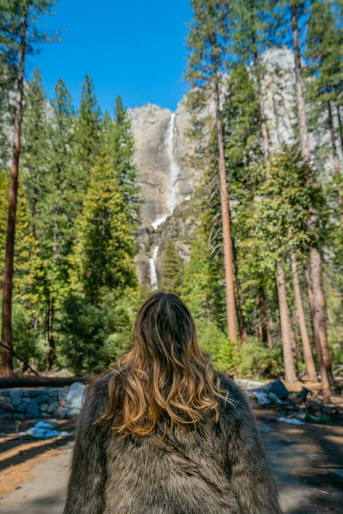 Megan-looking-at-Yosemite-Falls-in-Yosemite-National-Park-in-winter