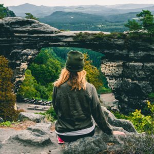 Megan looking at pravcicka brana in bohemian switzerland national park in the czech republic