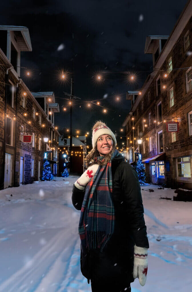Megan looking at the twinkling lights at Historic Properties in Halifax Nova Scotia at Christmas