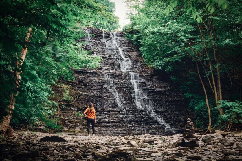 Megan-looking-at-waterfall-near-Owego-in-Finger-Lakes-Wine-Country
