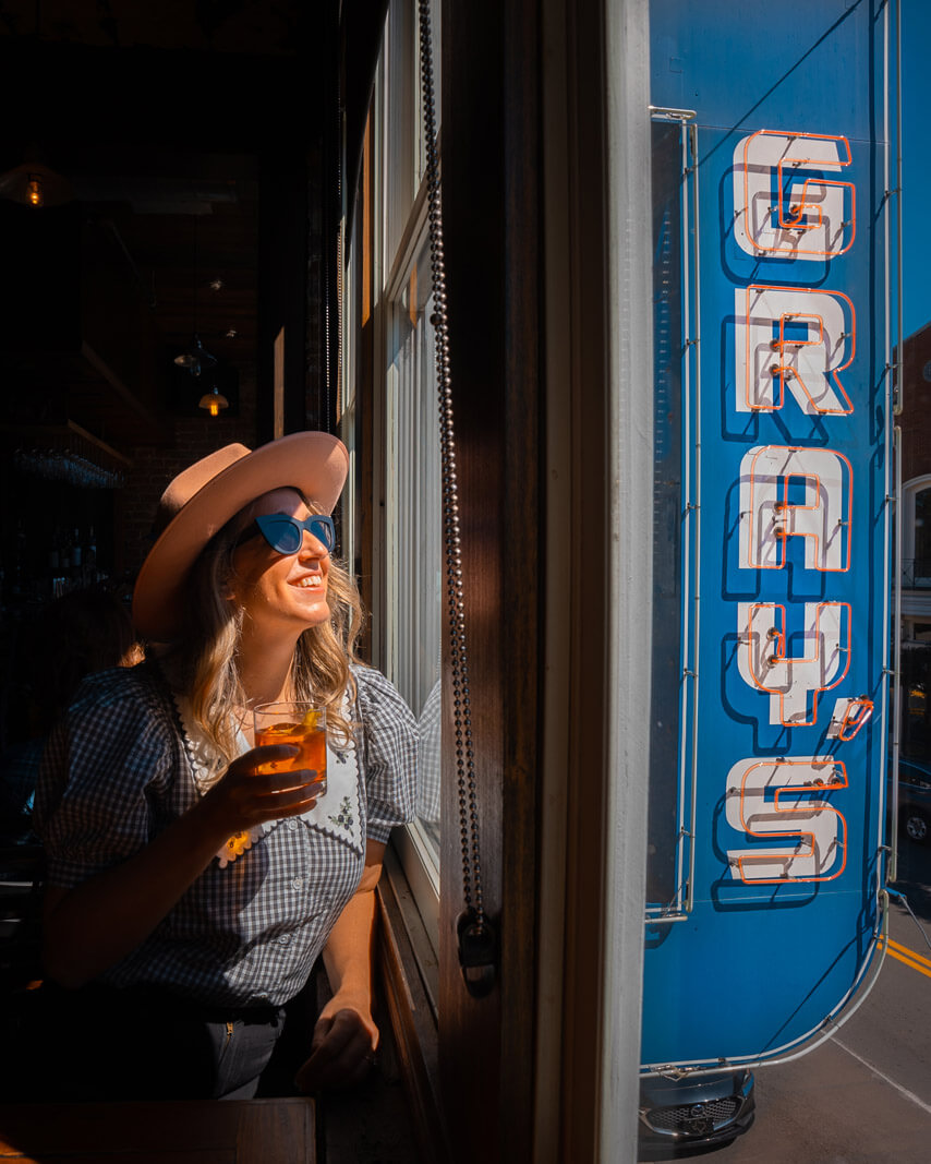 Megan looking out the window at Grays on Main in Franklin TN