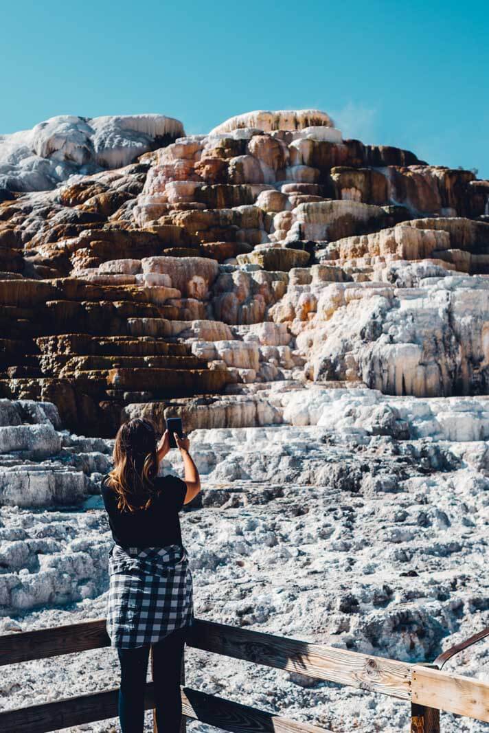 Megan photographing the unique Mammoth Hot Springs in Yellowstone