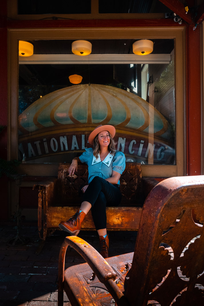 Megan sitting outside a shop in Leipers Fork Tennessee