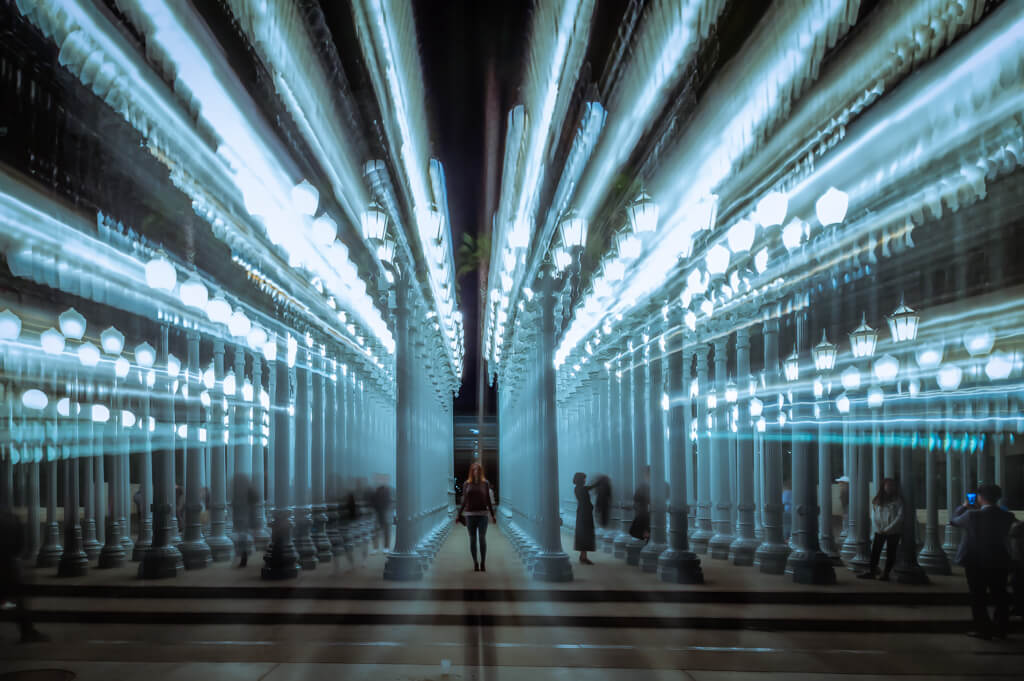 Megan standing at the Urban Light installation at LACMA in Los Angeles