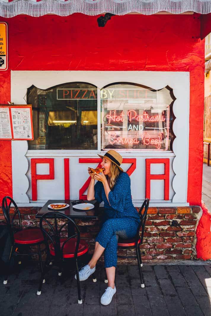 Megan eating at Antonios pizza in Catalina