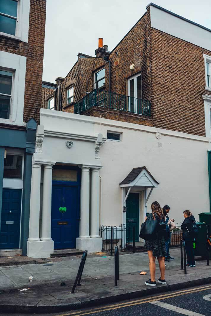 Megan taking a photo of the Notting Hill House