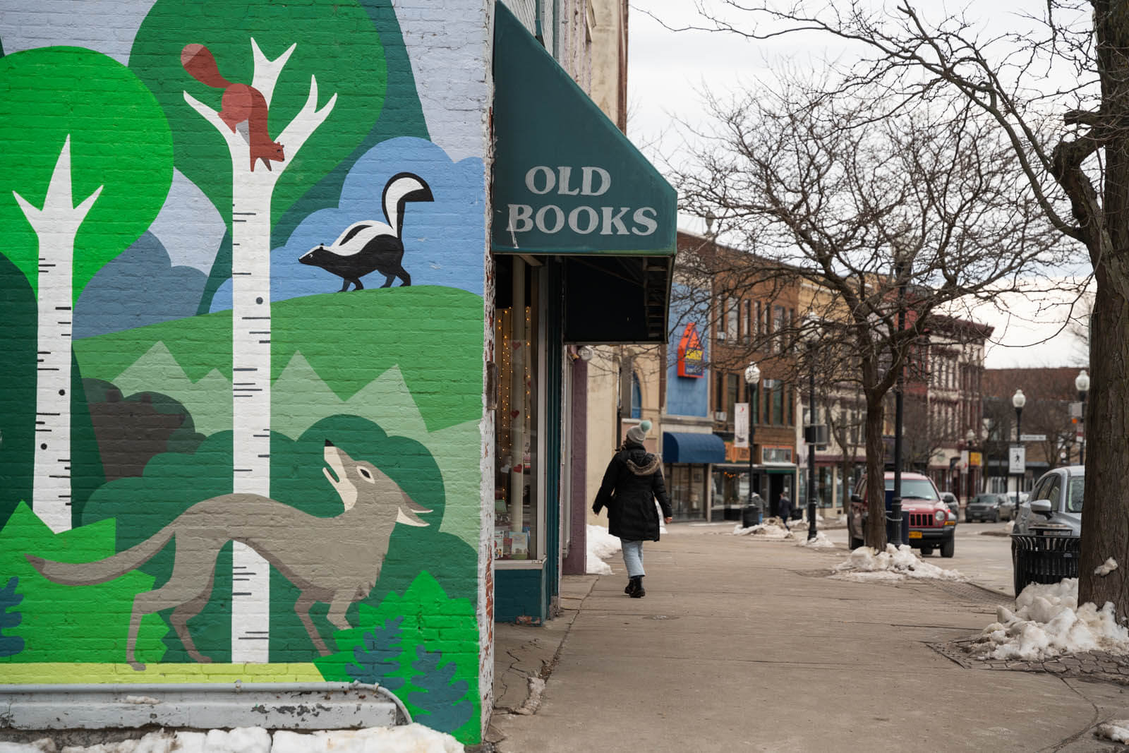 Megan walking down Margaret Street in downtown Plattsburgh New York by Corner Stone Bookshop