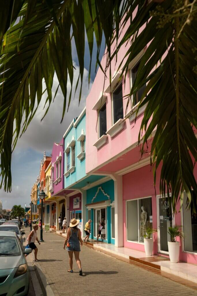 Megan walking through the colorful streets of Kralendijk Bonaire