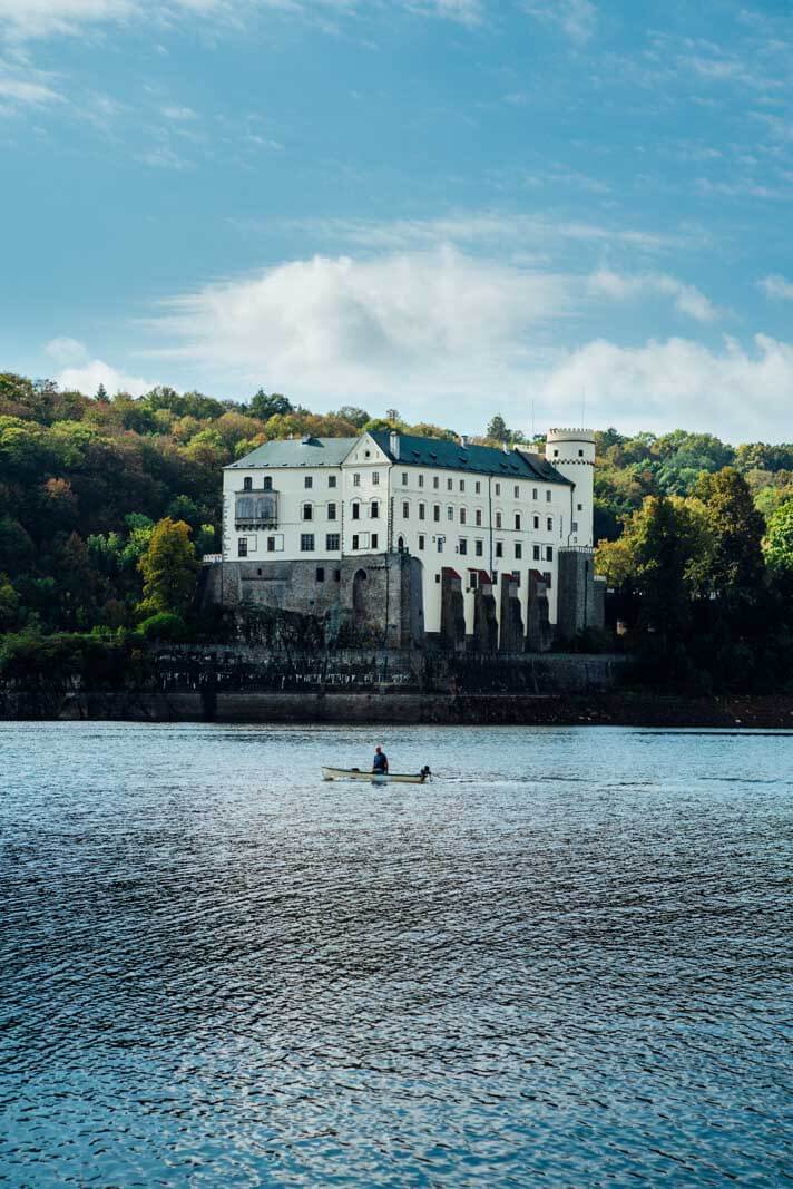 Orlik Castle with a small boat in South Bohemia