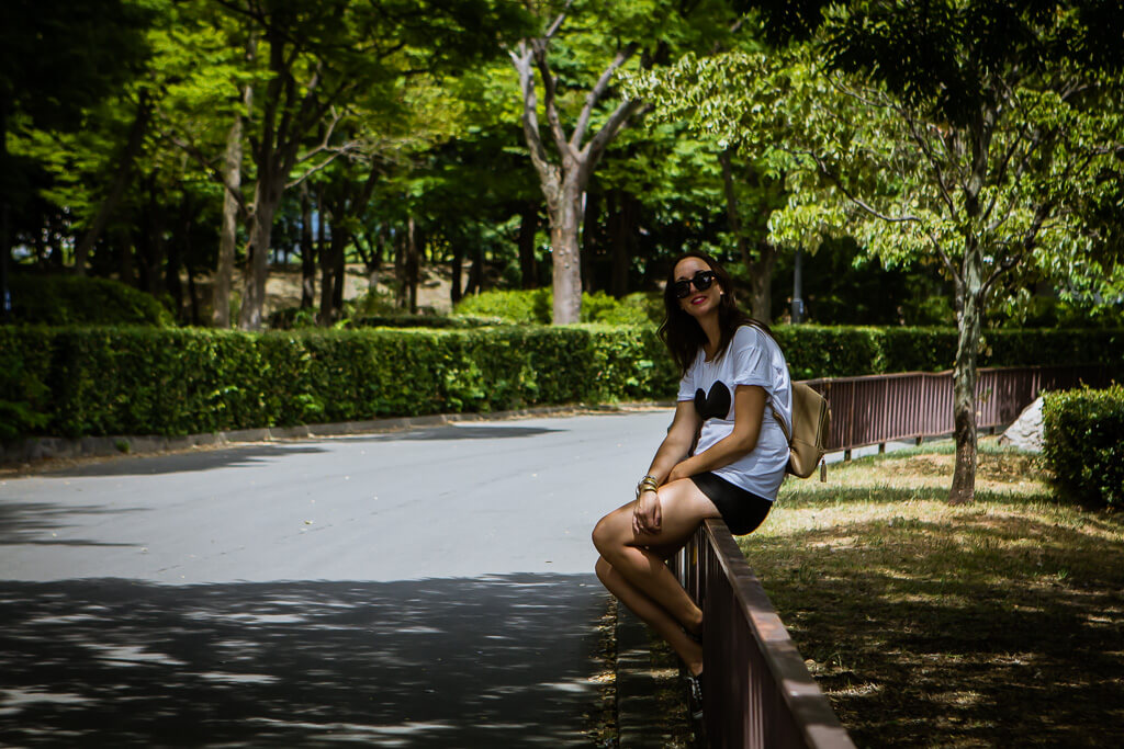 Girl on rail at Osaka Castle