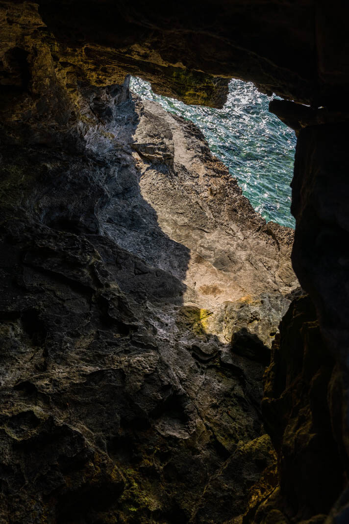 Peeking down to see Jeffreys Cave in Spittal Pond Nature Reserve in Bermuda