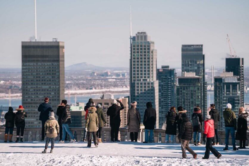 People enjoying the view at Mont Royal of Montreal below
